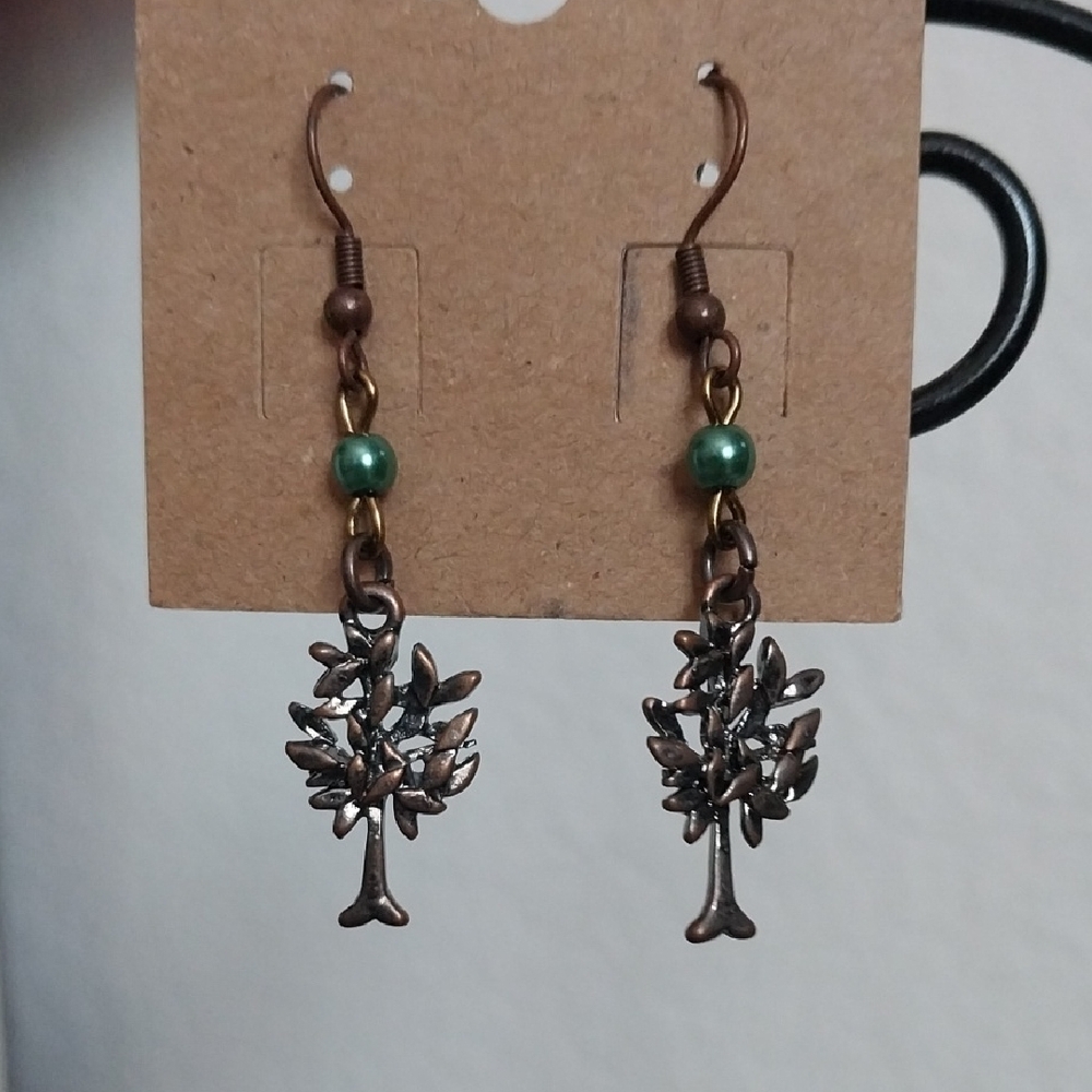 Green and Brown Vintage-Inspired Earrings with Ornate Metalwork